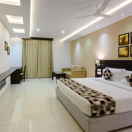 Essentia Manipal Inn Udupi Bagian luar foto