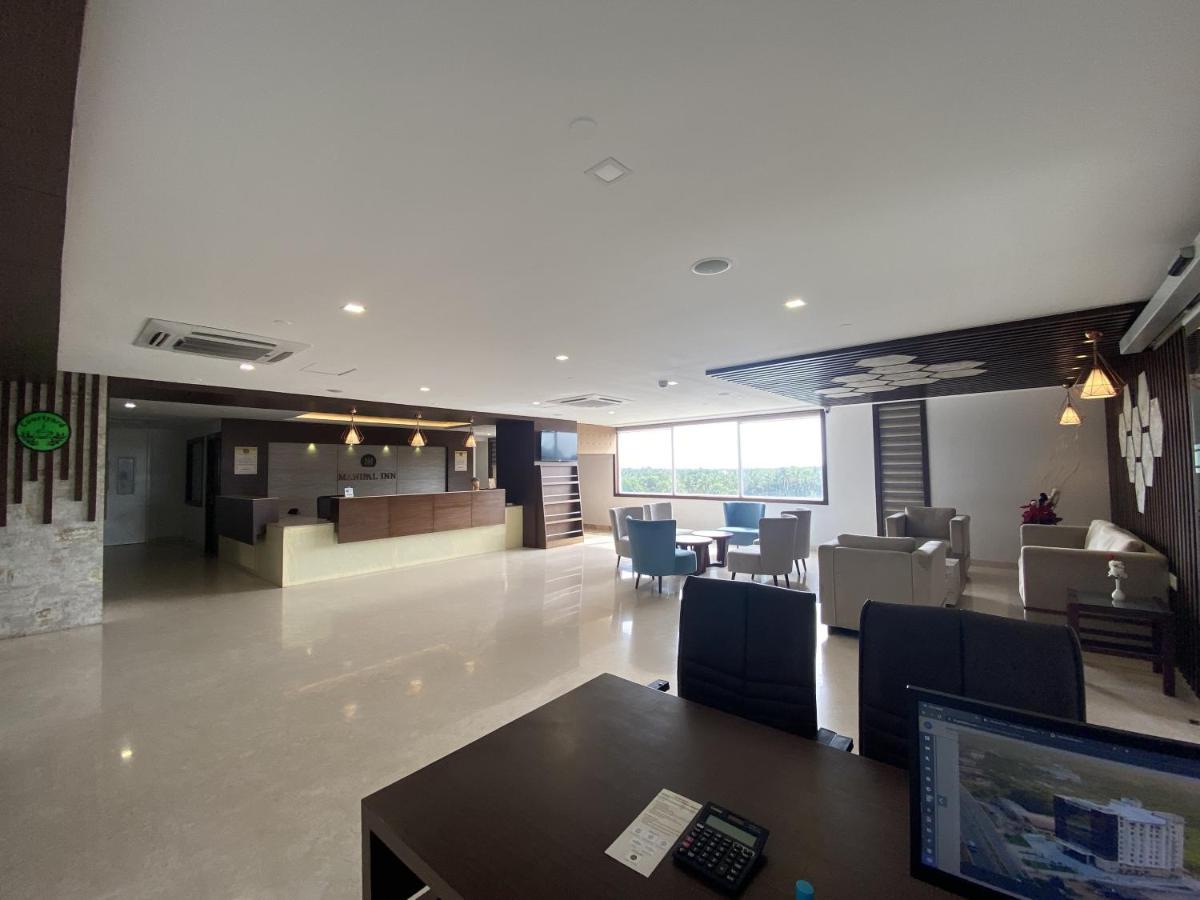 Essentia Manipal Inn Udupi Bagian luar foto