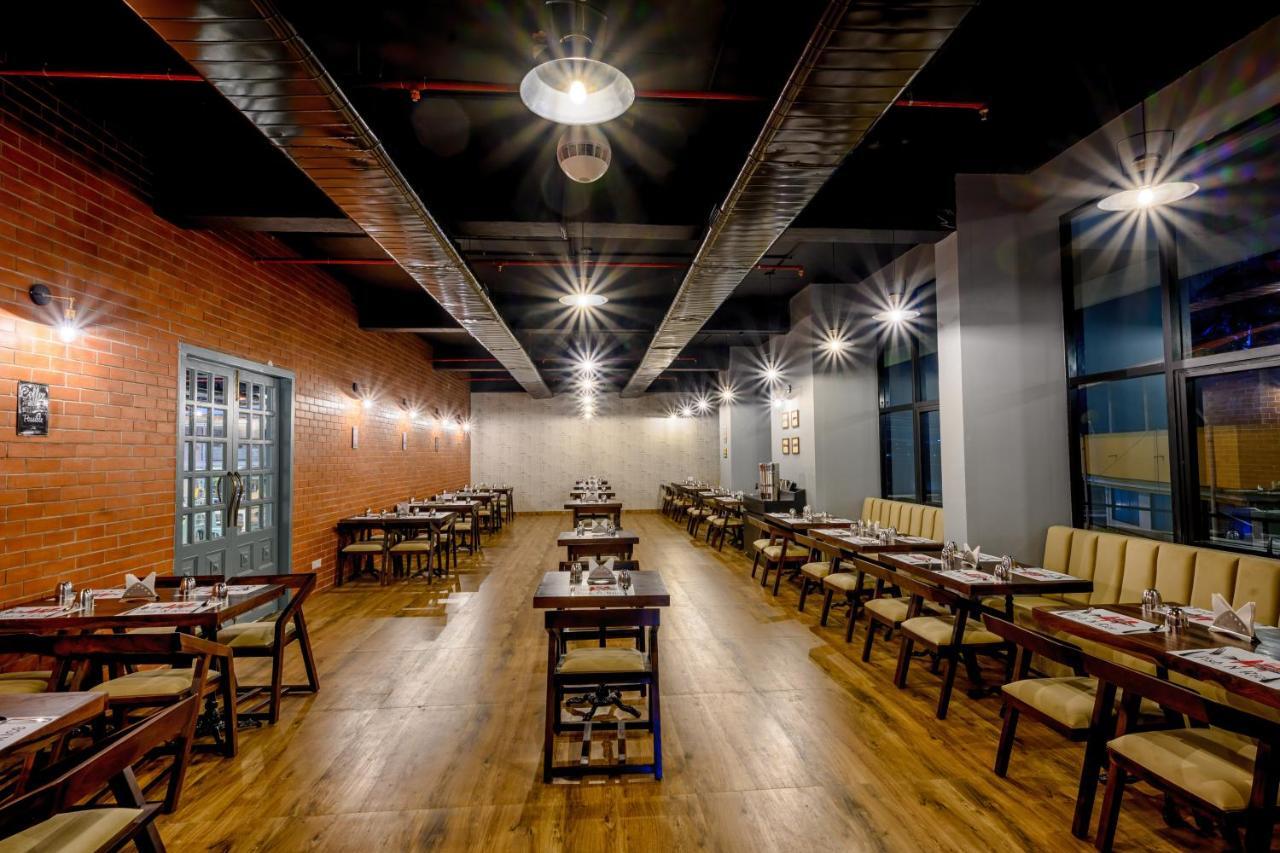 Essentia Manipal Inn Udupi Bagian luar foto