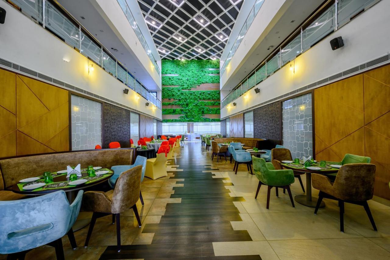 Essentia Manipal Inn Udupi Bagian luar foto